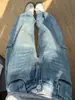 Light blue curved hem jeans for women, 2026 spring/autumn new style, high-waisted, slimming, stylish high street workwear wide-leg pants