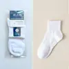 Calcetines de empaque individual para hombre, calcetines de algodón para hombre de color liso para otoño e invierno, calcetines para hombre al por mayor, calcetines deportivos de tubo largo para hombre