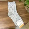 Calcetines de Algodón de Caña Media con Estampado Completo de Lazo Nuevos para Primavera Temprana de Mujer Importados de Kikiya Dongdaemun Coreano