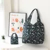 Nueva bolsa de compras plegable impermeable con estampado 210D Cuadros bolsa de protección ambiental 2 en 1 bolsa de compras bolsa de almacenamiento de dibujos animados