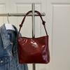 Bolso tipo cubo de alta apariencia Modelo Nuevo 2025 Color Sólido Personalidad Tendencia Bolso de Mano Bolso de Mano para Commuter de Ins Bolso de Hombro para Debajo del Brazo