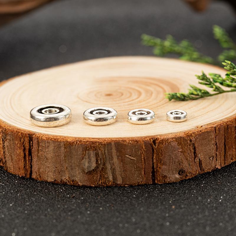 Z02藏银回字纹隔片