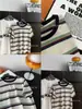 Nuevo Top Versátil Adelgazante de Estilo Coreano Casual Holgado para Primavera/Verano 2026, Camiseta de Manga Corta Rayada de Puntos de Marca de Moda Ins para Mujer