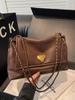 Bolso Otoño e Invierno Vintage de Gran Capacidad para Mujer 2024 Nueva Llegada Moda Combinable Cadena Hombro Cruzado Bolso Tote Portátil