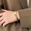 Pulseira de Aço Titânio com Trevo de Quatro Folhas em Toda a Peça para Meninas, Corda Vermelha, Joia de Mão Leve e Exquisita, de Luxo, Não Desbota, Venda Quente Transfronteiriça