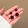 Pendientes rojos de Año Nuevo para mujer, otoño e invierno, con lazo, con clip para las orejas, nuevos pendientes de perla de Año Nuevo 2024