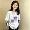 Camiseta de manga larga de algodón puro con retazos a rayas para niñas, versátil, para primavera y otoño, para niños mayores, estilo coreano, corte holgado, efecto dos piezas, moderna