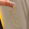 "Subiendo paso a paso" pulsera de bambú para mujer, diseño de nicho ins, nuevo estilo chino, color dorado, exquisita, lujo ligero, de alta gama, accesorio de mano versátil