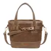 Bolso de mano de nicho de lujo ligero para mujer 2026 nuevo elegante versátil tipo cubo textura de alta calidad bandolera cruzada