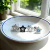 Clavos para Hélix de Estrella de Cinco Puntas con Incrustaciones de Zirconia y Cobre Clavos para Hélix de Acero de Titanio Estilo Ins Pendientes Versátiles Elegantes Estilo Caliente