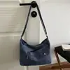 Otoño 2026 Nuevo Bolso de Mezclilla Bolso Cruzado Casual Estilo Perezoso Bolso de Tela Artístico para el Trabajo Bolso Cruzado Pequeño