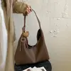 Bolso de hombro nuevo para mujer 2026 transfronterizo, bolso retro para el día a día, bolso grande de capacidad para llevar debajo del brazo, bolso tote para madre e hija