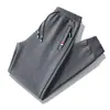Pantalones deportivos de otoño para hombre, pantalones casuales, transpirables, para correr, de punto, con bolsillo y cremallera
