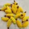 Colgantes hechos a mano terminados: caqui, cacahuete, manzana, fresa, melocotón, pera, llaveros, girasoles de hilo, productos tejidos al por mayor