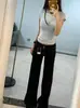 Calça jeans boca de sino de cor escura estilo americano para mulheres, novo modelo primavera e outono 2026, corte solto, não aperta nas pernas, madura e elegante, calça bootcut de cintura baixa