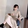 Otoño e invierno nuevo estilo ropa interior estilo Hepburn suéter francés falda suéter de lana medio cuello alto vestido de punto falda de mujer