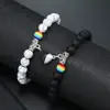 Venta caliente transfronteriza pulsera de piedra natural simple europea y americana para pareja de hombres y mujeres, pulsera magnética de amor en blanco y negro, juego para pareja