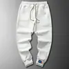 Pantalones Hombre Primavera y Otoño Moda ins Nueve Puntos Guapo Estudiante Pareja Casual Deportivos Pantalones de Chándal Hombre