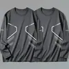 Camiseta casual versátil de manga larga para hombre para otoño, cuello redondo, color liso moderno, cómoda, transpirable y de corte holgado.