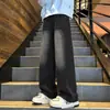 Calças Outono Outono 2026 Novas Estilosas Retas de Pernas Largas Homens Mulheres Temporada Outono Outono Jeans Soltos Preto Azul Algodão