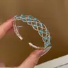 Pulsera de cuentas huecas con zirconia azul, elegante y lujosa, sensación de alta gama, diseño de nicho, pulsera abierta versátil