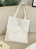 65213 Bolso de Lona Blanco Leche con Puntos y Accesorios de Moño de Encaje, Estilo Casual para Salidas Estudiantiles, Bolso Artístico de Hombro