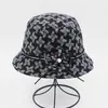 Sombrero para mujer de mediana edad y anciana sombrero de cubo coreano otoño e invierno sombrero de pescador primavera y otoño sombrero de copa de tela informal sombrero de suegra sombrero de suegra
