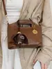 Yuezhi 2026 principios de otoño nueva moda casual bolso pequeño, bolso tipo cubo para debajo del brazo, bolso de hombro y cruzado elegante y versátil