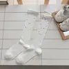 Calcetines Finos de Verano para Mujer, Calcetines Largos de Malla Hueca con Lunares y Lazo, Calcetines Versátiles de Media Pierna Estilo Miu