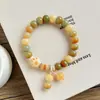 Nuevo brazalete de raíz de bodhi con forma de gato quemado al carbón estilo chino, lindo y de nicho para que jueguen los estudiantes, brazalete decorativo de pata de gato de bodhi para mujeres