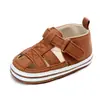 Sapatos para bebês e crianças pequenas primavera e verão novos sapatos para bebês e crianças pequenas sandálias respiráveis vazadas sapatos de bebê atacado 2042