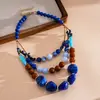Collar de cuentas geométricas degradado colorido transfronterizo europeo y americano, cadena para la clavícula estilo resort de playa, joyería de lujo ligero de alta gama al por mayor