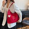 Bolsa Tote de Ombro/Axila Grande Capacidade para Deslocamento Diário Verão 2026 Novo Estilo Simples Casual Estudante Com Letras Transfronteiriça