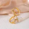 Pendientes Europeos y Americanos Geométricos Redondos Incrustados Imitación Turquesa Ojo de Gato Acero de Titanio Acero Inoxidable de Alta Gama Elegantes Modernos