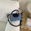 Bolsa de Ombro Color Block Estilosa Nova de Verão 2026 Transfronteiriça para Mulheres, Bolsa Transversal de Ombro Único Nicho, Bolsa Simples para Celular