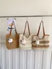 Bolsa Grande de Mão Feminina de Ombro Único Design de Nicho Bolsa de Praia para Férias na Praia Bolsa Tote Tecida de Palha para o Dia a Dia