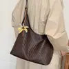 Bolso de axila de alta gama para mujer 2026 nuevo de moda tejido patrón vintage de un solo hombro bolso madre-hija transfronterizo