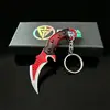 Colgante llavero temático del juego Delta Force, con una versión miniatura del modelo de arma Estrella del Norte, un artículo decorativo y un pequeño regalo