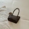 Nova bolsa tote de grande capacidade para o início do outono de 2026, bolsa de ombro simples para mulheres, bolsa de mão estilosa e atraente