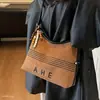 Bolso tote versátil, gran capacidad, bolso de hombro, casual, para el trabajo, estilo nuevo, gamuza, con diseño de letras, para mujer, 2026, para ir al trabajo