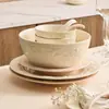 Los cuencos con relieve de fábrica son adecuados para vajilla de color bajo vidriado plato de cena creativo de alto valor platos de cerámica adecuados platos platos