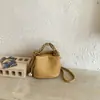 Bolso tipo cubo único y elegante para mujer, nueva versión coreana primavera 2026, bolso de hombro simple, bolso cruzado casual de moda