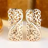 Pendientes Vintage Estilo Palacio Huecos Retorcidos Rongxing con Cierre de Metal con Patrón Repujado para Mujer