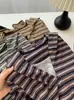 Sudadera con capucha a rayas estilo dos piezas para mujer, top casual de moda coreana, nueva para otoño de 2026