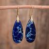 Comercio exterior comercio electrónico nuevos aretes de piedra emperador gota de agua azul oscuro moda simple aretes de piedra natural joyería al por mayor