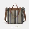 Bolso de Lona Versátil de Gran Capacidad Transfronterizo con Rayas Francesas y Bloques de Color, Bolso de Hombro Artístico Estilo Estudiante