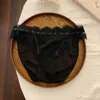 Calcinha de renda fina e confortável para mulheres, estilo francês, sexy, com trama de rede studded, padrão de cílios, cintura baixa.