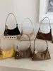 Bolso de mano retro de gamuza de nicho estilo coreano transfronterizo para mujer, nueva colección 2026, adecuado para el uso diario y para ir al trabajo, se puede llevar como bolso de hombro o bolso cruzado