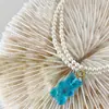 Collar de oso de resina con perlas de imitación de hada súper dulce europea y americana, lindo oso de color caramelo de dibujos animados, cadena de clavícula doble