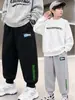 Pantalones para niños, pantalones de chándal para niños, nuevos pantalones deportivos de moda para otoño e invierno para niños, pantalones casuales de corte holgado para niños mayores y estudiantes de primaria